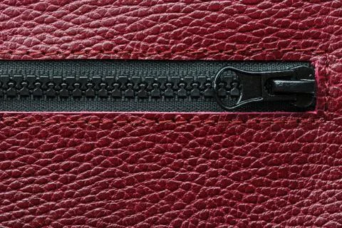Black lock with lightning on a red textural background Stock Photos