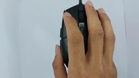 Black Logitech branded computer or laptop mouse Stock Photos