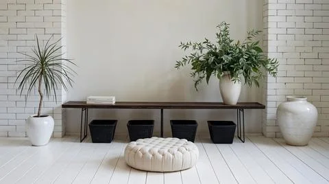 Black long seat in front of white brick wall, 3D illustration, loft style. Stock Photos