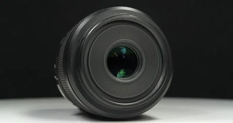 Black macro camera lens, video on black background Stock Footage 342142501