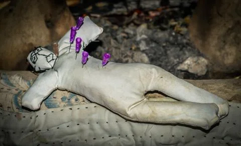 Black magic and doll Stock Photos