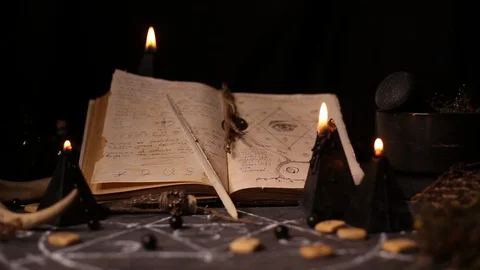 Black magic candles burn Stock Footage 128353609