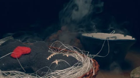 Black magic. detailed. Voodoo doll figurine made of felt in thick white smoke. Stock Footage 142873970