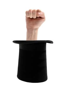 Black magic hat and hand Stock Photos