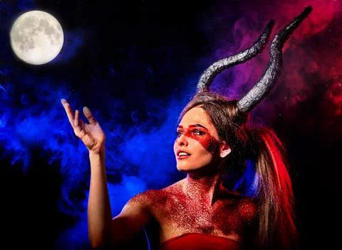 Black magic ritual of mad satan woman . Halloween moon sky. Stock Photos