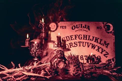 Black magic session and pagan rites with dramatic lighting. Stock Photos