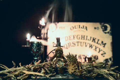 Black magic session and pagan rites with dramatic lighting. Stock Photos