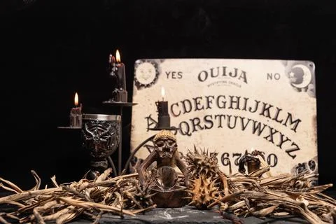 Black magic session and pagan rites with dramatic lighting. Stock Photos