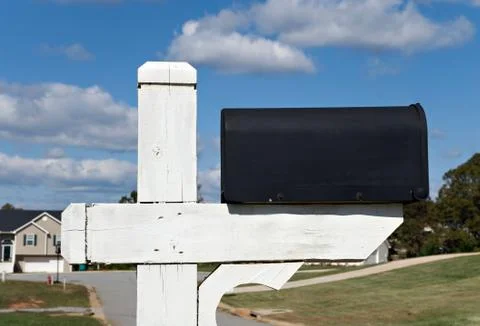 Black mailbox and sky Stock Photos