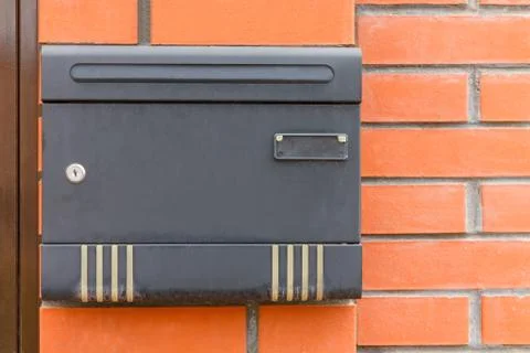 Black mailbox on the wall Stock Photos