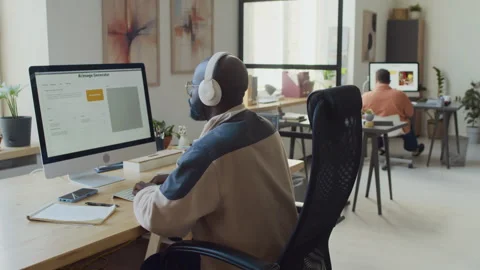 Black Male Developer Writing Text Prompt for AI Image Generator Software Stock Footage 293171592