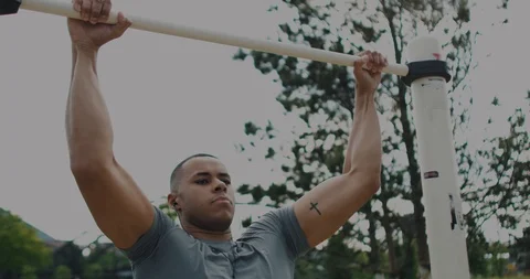 Black Male looking into Camera after doing pull up Stock Footage 85510172
