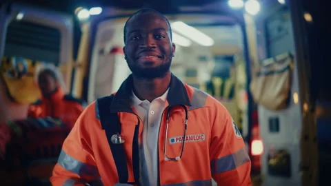 Black Male Paramedic Portrait Next to Ambulance Stock Footage 141573562