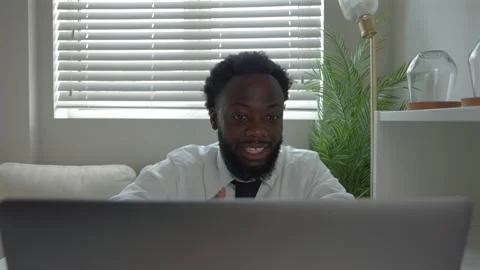 Black Male Remote Worker In Tense Video Call At Home Office Stock Footage 319987729