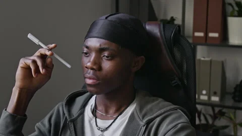 Black Male Software Engineer Thinking and Working in Office Stock Footage 336708588