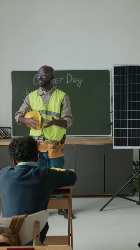 Black Male Solar Battery Engineer Speaking to Class at School Career Day Stock Footage 282953884