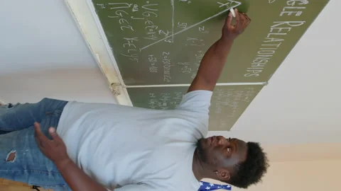 Black Male Student Solving Geometry Problem Stock Footage 237907255