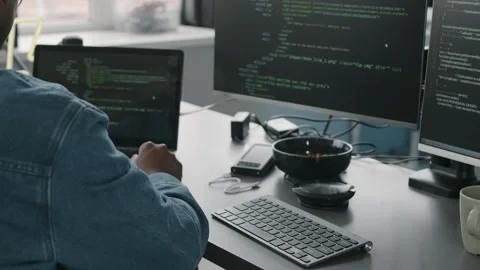 Black Male System Administrator Coding in Office Stock Footage 276203728