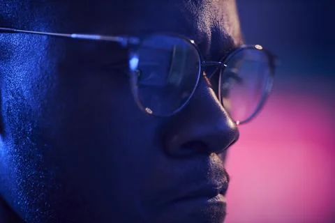 Black Man Analyzing Cyber Data on Computer Screen in Office Stock Photos