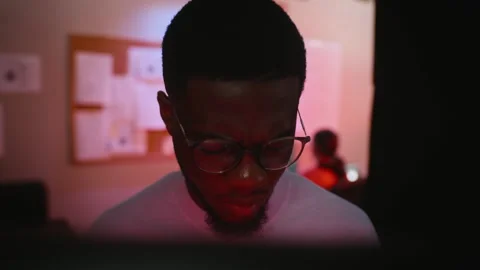 Black Man Analyzing Cybersecurity Breach on Computer Screen Stock Footage 346813156