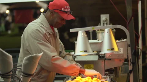 Black man baking donuts Video stock 62655958
