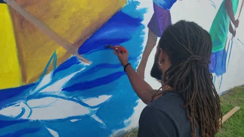 Black Man with beard Afro Caribbean Artist painting, 4K Stock Footage 154521161