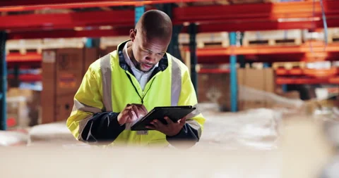 Black man, boxes or tablet for shipment inspection in warehouse distribution of Stock Footage 282859354