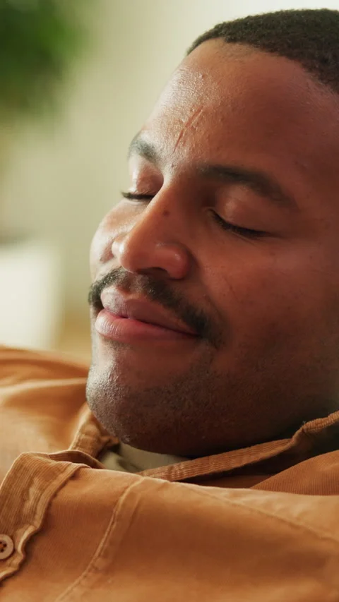 Black man, calm and relax in house, thinking and smile with positive mindset for Stock Footage 340798610