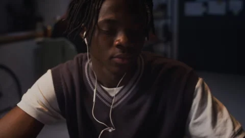 Black Man Checking Phone Alarm for Late Night Office Work Stock Footage 338417294