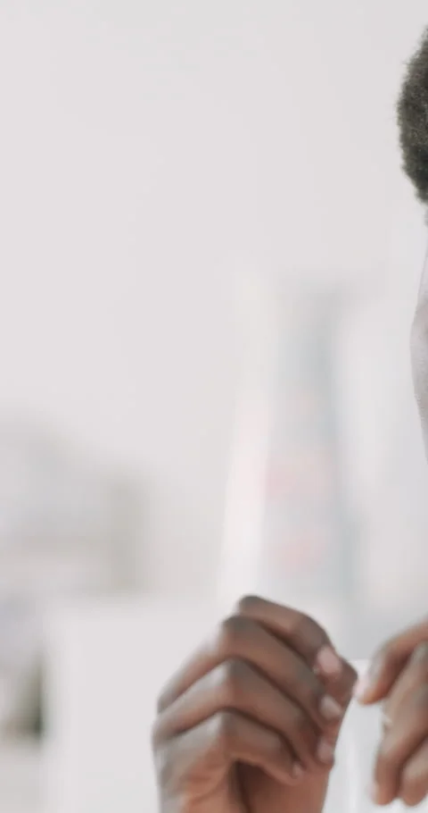 Black man, cleaning and teeth with dental floss in bathroom for bacteria or germ Stock Footage 329751274