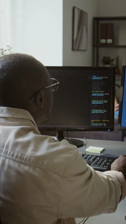 Black Man Coding Software Program on Computer Monitor in Office Stock-Footage 348152297