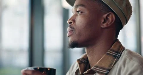 Black man, coffee and thinking in cafe for memory, drink and relax with ins.. Stock Photos
