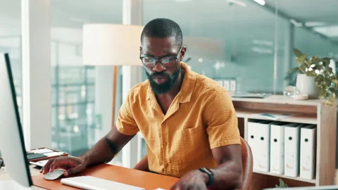 Black man, computer and documents with review at office for typing, confused or Stock Footage 330099976
