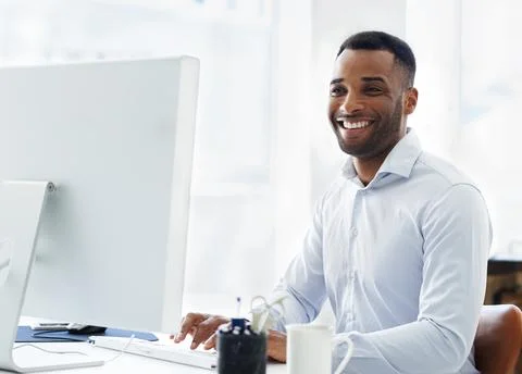 Black man, computer and software developer at desk, online and design website on Stockfoto's