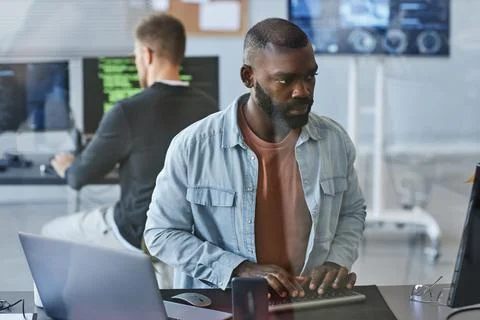 Black Man As Computer Programmer Stock Photos