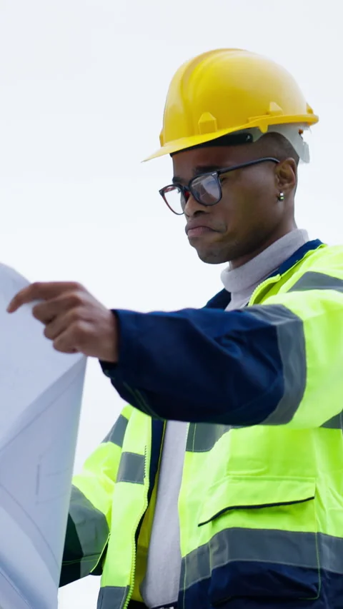 Black man, construction and review blueprint outdoor, architecture or Stock Footage 336707207