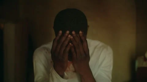 Black Man crying on his bed Stock Footage 279388499