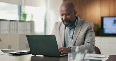 Black man, document and laptop in office for project management, report or email Stock Footage 335202617