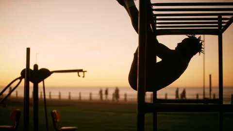 Black man doing exercise outdoors during sunset Stock Footage 279292139