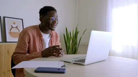 Black man doing online video call at home using laptop. Online meeting.4k video. Stock Footage 234656400