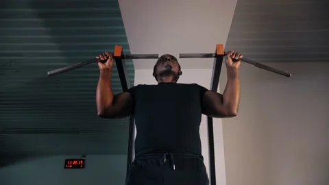 Black man doing workout in the gym.Athletic man training back muscle doing pull Stock Footage 227201952
