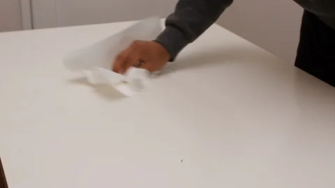 Black man dries off table Stock Footage 129207899