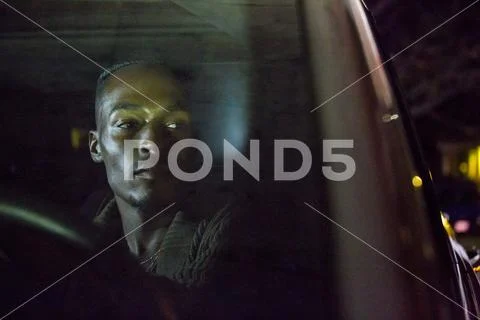 Black man driving car Stock Photos