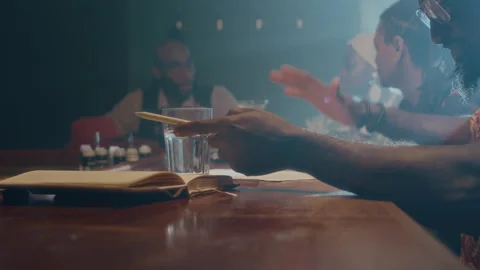 Black Man Drumming on Table and Tapping Pen on Glass Stock Footage 281067717