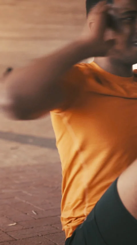 Black man, exercise and sit ups in city for fitness, strong core or outdoor with Stock Footage 329770380
