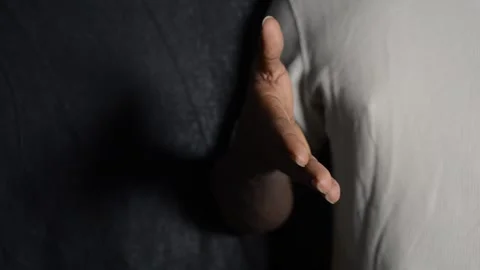 A black man extends his arm for a handshake Stock Footage 277435778