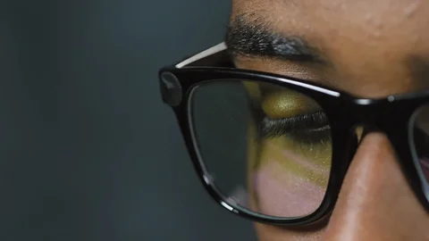Black Man in Eyeglasses while Working with Computer Video stock 103526346