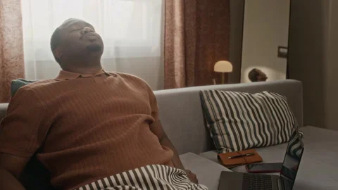 Black Man Feeling Frustrated Working Remotely on Laptop Stock Footage 337718713