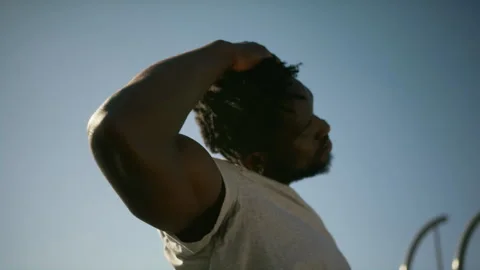 Black man getting ready for street workout and warming up Stock Footage 279312691