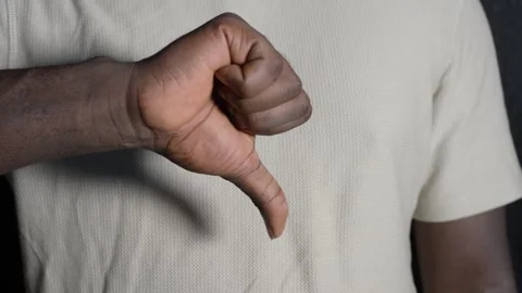 A black man gives a thumbs down Stock Footage 277435361